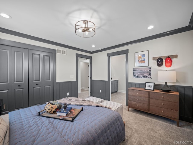 24654 Floret, Macomb, MI 48042 - bedroom featuring a wainscoted wall, crown molding, recessed lighting, a closet, and light carpet