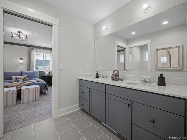24654 Floret, Macomb, MI 48042 - bathroom featuring connected bathroom, double vanity, tile patterned floors, and recessed lighting