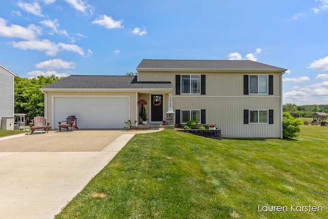14734 Crescent Meadows Dr, Cedar Springs, MI 49319 - tri-level home with a front lawn, driveway, and a garage