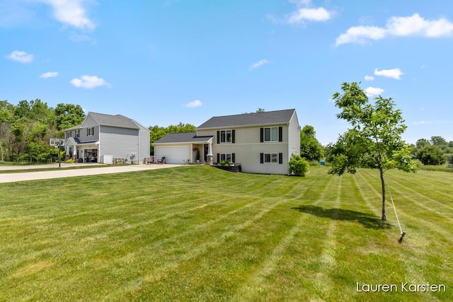 14734 Crescent Meadows Dr, Cedar Springs, MI 49319 - view of front facade with a front yard, driveway, and a garage