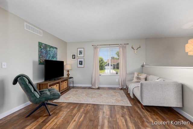 14734 Crescent Meadows Dr, Cedar Springs, MI 49319 - living area with wood finished floors and baseboards