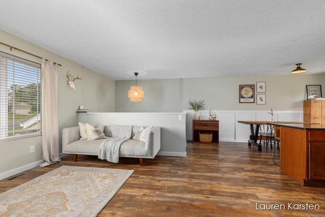 14734 Crescent Meadows Dr, Cedar Springs, MI 49319 - living room with dark wood finished floors and baseboards