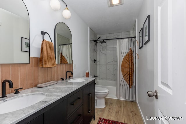 14734 Crescent Meadows Dr, Cedar Springs, MI 49319 - full bathroom with double vanity, shower / bath combination with curtain, wood finished floors, and decorative backsplash