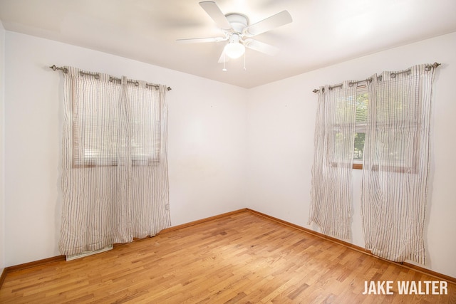 1428 Matilda St NE, Grand Rapids, MI 49503 - empty room with wood finished floors and a ceiling fan