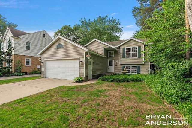 1910 Hall St SE, Grand Rapids, MI 49506 - view of front of property with an attached garage, concrete driveway, and a front lawn