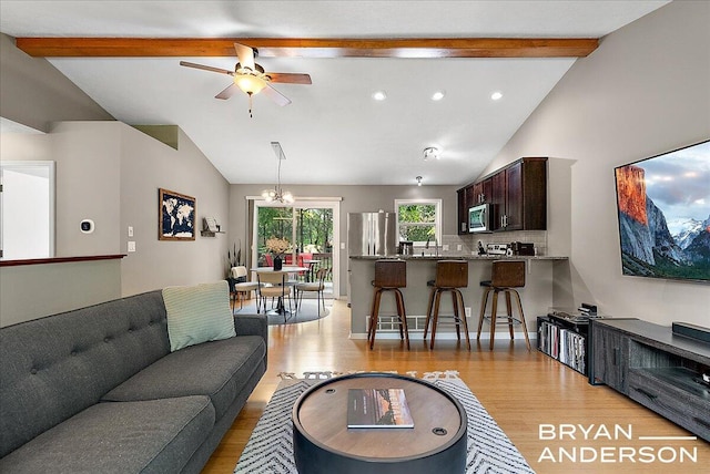1910 Hall St SE, Grand Rapids, MI 49506 - living room featuring light wood-style floors, ceiling fan, a chandelier, and recessed lighting