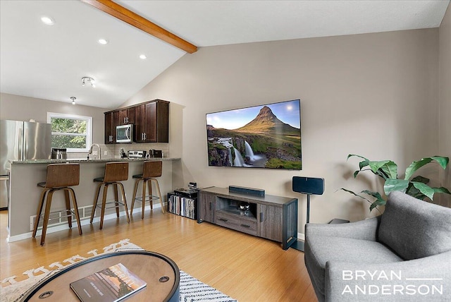 1910 Hall St SE, Grand Rapids, MI 49506 - living room featuring light wood-style floors and recessed lighting