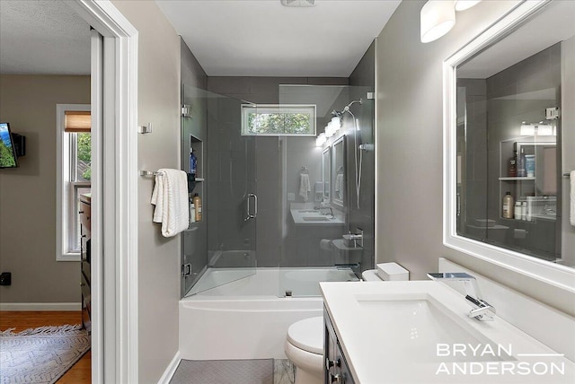 1910 Hall St SE, Grand Rapids, MI 49506 - full bath featuring plenty of natural light, vanity, and bath / shower combo with glass door