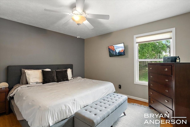 1910 Hall St SE, Grand Rapids, MI 49506 - bedroom featuring light wood-type flooring and a ceiling fan