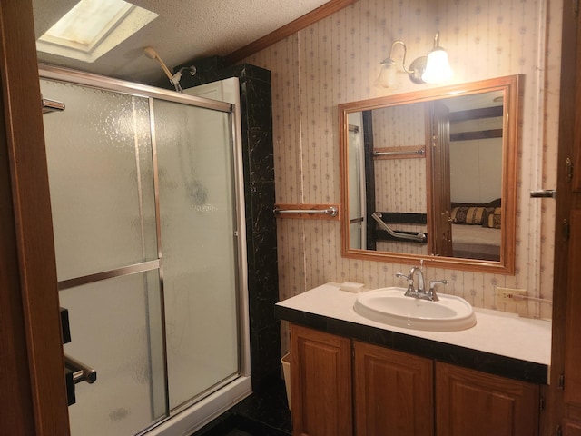 1593 W Centerline Rd, Baldwin, MI 49304 - bathroom featuring wallpapered walls, a shower stall, vanity, and a skylight