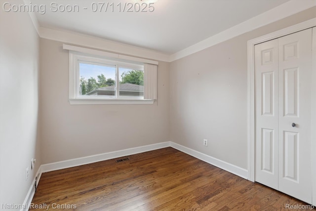 32203 Anita Dr, Westland, MI 48185 - empty room with wood finished floors and baseboards