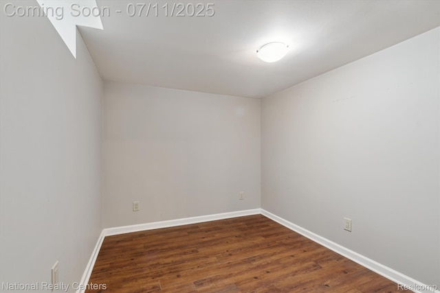 32203 Anita Dr, Westland, MI 48185 - unfurnished room featuring dark wood finished floors and baseboards