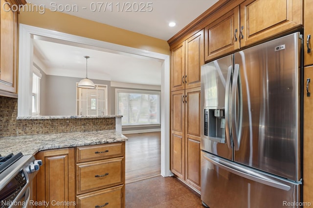 32203 Anita Dr, Westland, MI 48185 - kitchen featuring stainless steel appliances, brown cabinetry, decorative backsplash, light stone countertops, and recessed lighting