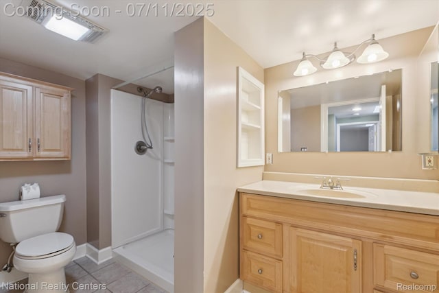 32203 Anita Dr, Westland, MI 48185 - full bath with vanity, tile patterned flooring, and walk in shower