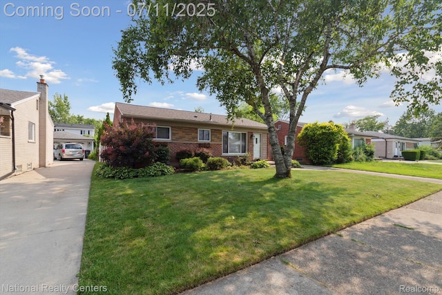 32203 Anita Dr, Westland, MI 48185 - ranch-style house featuring a front lawn and brick siding