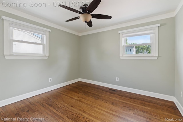 32203 Anita Dr, Westland, MI 48185 - unfurnished room with healthy amount of natural light, ceiling fan, dark wood-style floors, and crown molding