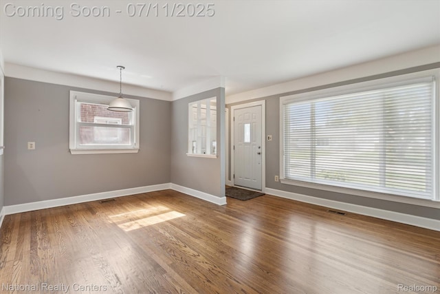 32203 Anita Dr, Westland, MI 48185 - entrance foyer with healthy amount of natural light and wood finished floors