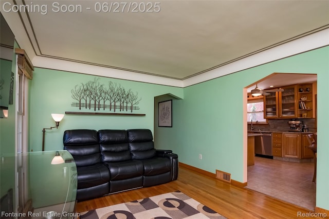 21626 Oconnor St, Saint Clair Shores, MI 48080 - living room featuring wood finished floors and a ceiling fan