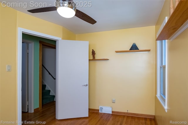 21626 Oconnor St, Saint Clair Shores, MI 48080 - spare room with ceiling fan, wood finished floors, and stairs
