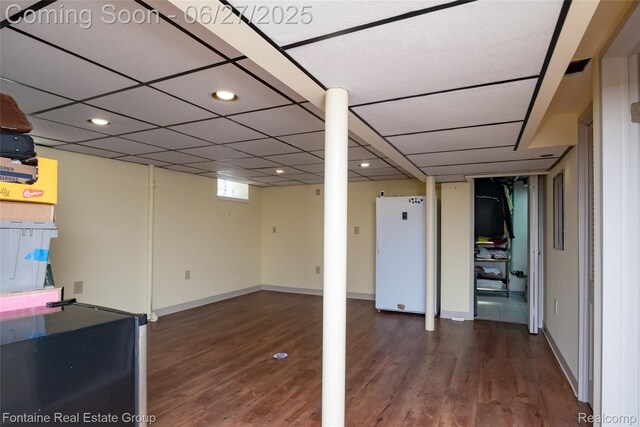 21626 Oconnor St, Saint Clair Shores, MI 48080 - basement featuring freestanding refrigerator, wood finished floors, and recessed lighting