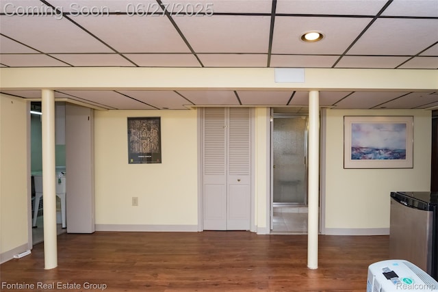 21626 Oconnor St, Saint Clair Shores, MI 48080 - finished below grade area with a drop ceiling, wood finished floors, and refrigerator