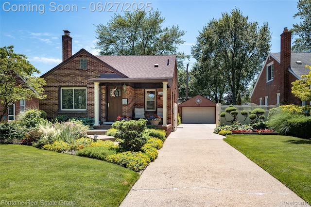 21626 Oconnor St, Saint Clair Shores, MI 48080 - english style home featuring a garage, a chimney, an outbuilding, brick siding, and roof with shingles
