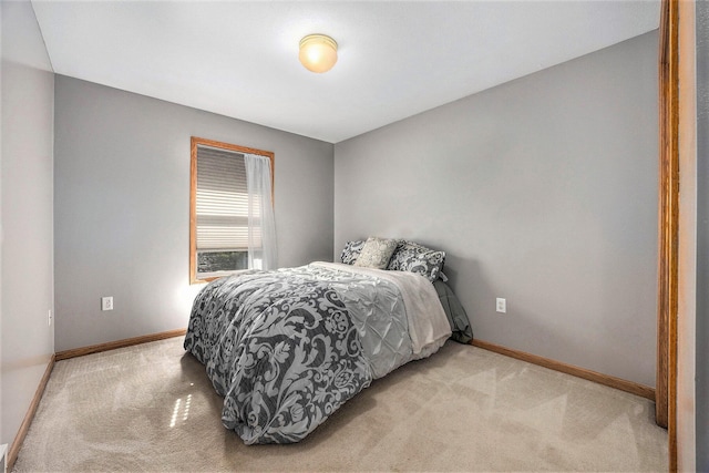 3700 Mapledge Ct NE, Cedar Springs, MI 49319 - bedroom featuring light carpet and baseboards