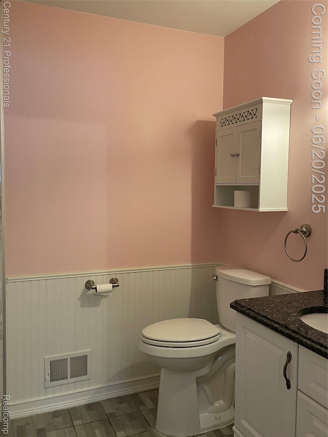 6850 Deerhurst Dr, Westland, MI 48185 - half bathroom with a wainscoted wall and vanity