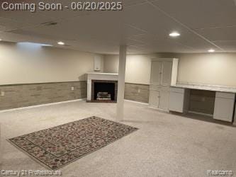 6850 Deerhurst Dr, Westland, MI 48185 - unfurnished living room featuring a fireplace, recessed lighting, and carpet