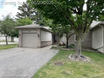 6850 Deerhurst Dr, Westland, MI 48185 - view of front of property featuring driveway and an attached garage