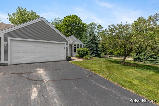 766 Clarewood Ct, Holland, MI 49423 - view of front of house featuring a front yard and asphalt driveway