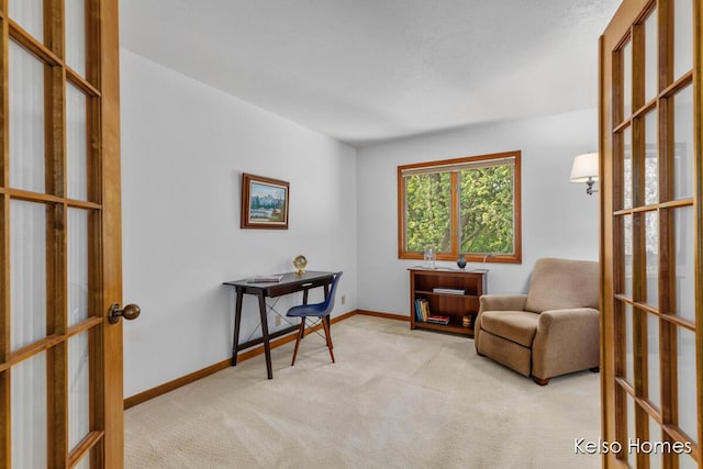 766 Clarewood Ct, Holland, MI 49423 - sitting room featuring light colored carpet and french doors