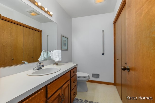 766 Clarewood Ct, Holland, MI 49423 - bathroom with vanity and toilet