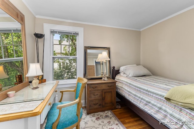 140 Lakeside Dr NE, Grand Rapids, MI 49503 - bedroom with light wood-style flooring and ornamental molding