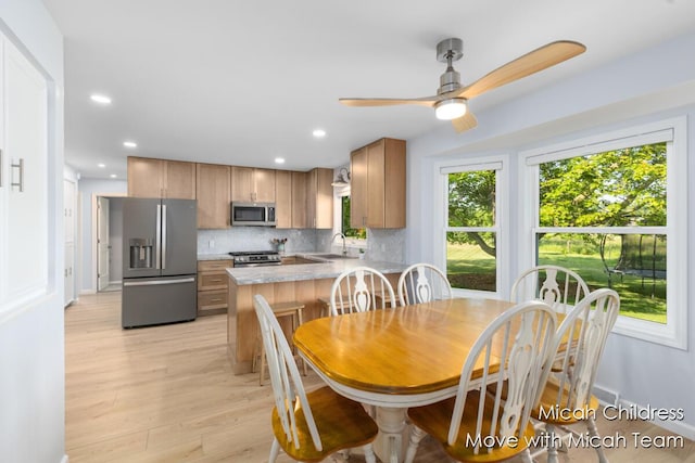 10829 26th Ave NW, Grand Rapids, MI 49534 - dining space with ceiling fan, light wood-style flooring, and recessed lighting