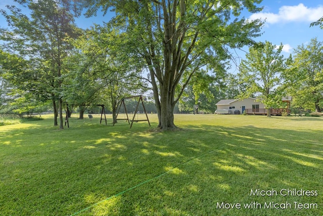 10829 26th Ave NW, Grand Rapids, MI 49534 - view of green lawn featuring a deck