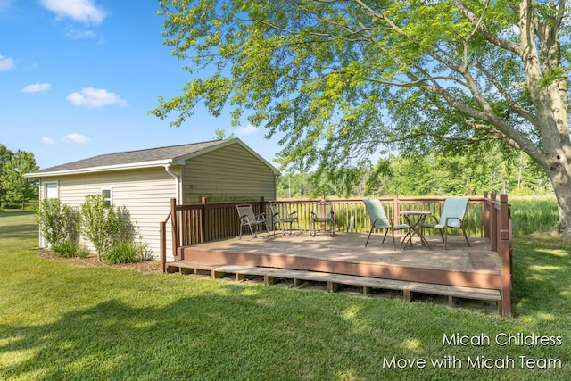 10829 26th Ave NW, Grand Rapids, MI 49534 - wooden terrace featuring a lawn