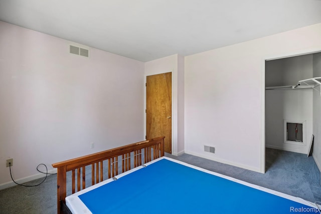 29680 Olympia Ct, Farmington Hills, MI 48336 - unfurnished bedroom featuring carpet floors, a spacious closet, and a closet