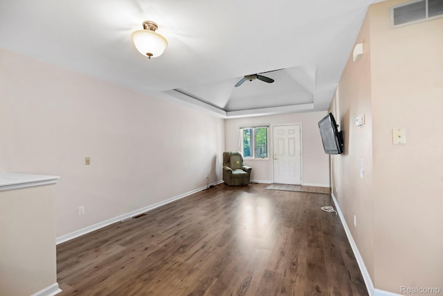 29680 Olympia Ct, Farmington Hills, MI 48336 - spare room featuring a ceiling fan, wood finished floors, and a raised ceiling
