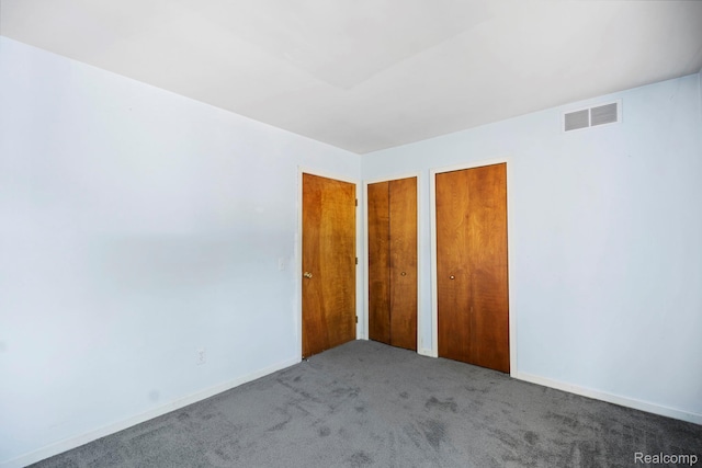 29680 Olympia Ct, Farmington Hills, MI 48336 - unfurnished bedroom featuring carpet and multiple closets