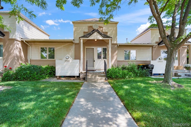 29680 Olympia Ct, Farmington Hills, MI 48336 - view of front of home with a front lawn and brick siding