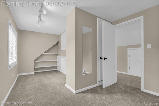 1717 Penistone St, Lake Orion, MI 48009 - interior space with carpet and built in shelves