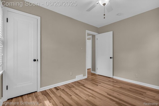 1717 Penistone St, Lake Orion, MI 48009 - unfurnished bedroom with light wood-type flooring and a ceiling fan