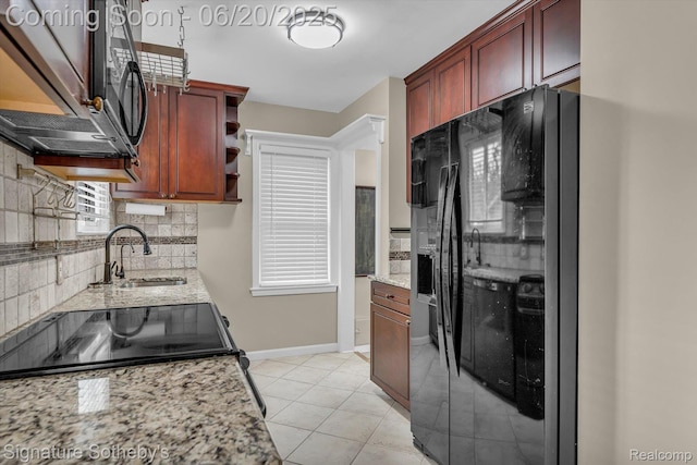 1717 Penistone St, Lake Orion, MI 48009 - kitchen with black appliances, tasteful backsplash, light stone countertops, and open shelves