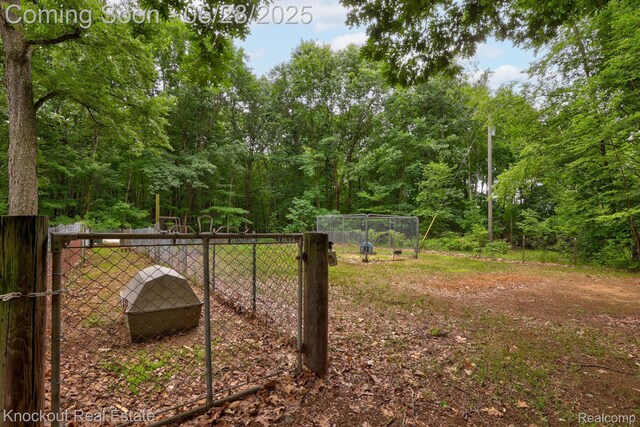 6275 Caine Rd, Vassar, MI 48768 - view of yard featuring a gate