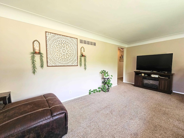 5365 Flushing Rd, Flushing, MI 48433 - living area featuring carpet floors and ornamental molding