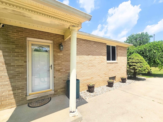 5365 Flushing Rd, Flushing, MI 48433 - property entrance with brick siding