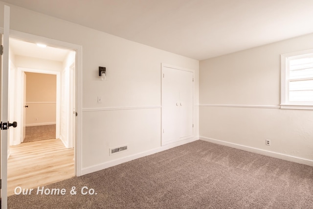 1716 Sycamore St, Saginaw, MI 48602 - empty room with light colored carpet and baseboards