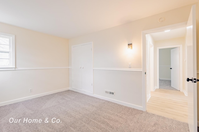 1716 Sycamore St, Saginaw, MI 48602 - carpeted spare room featuring baseboards and a smoke detector