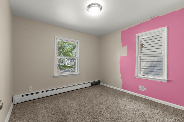 4933 Ziegler St, Dearborn Heights, MI 48125 - empty room with a baseboard heating unit and carpet flooring